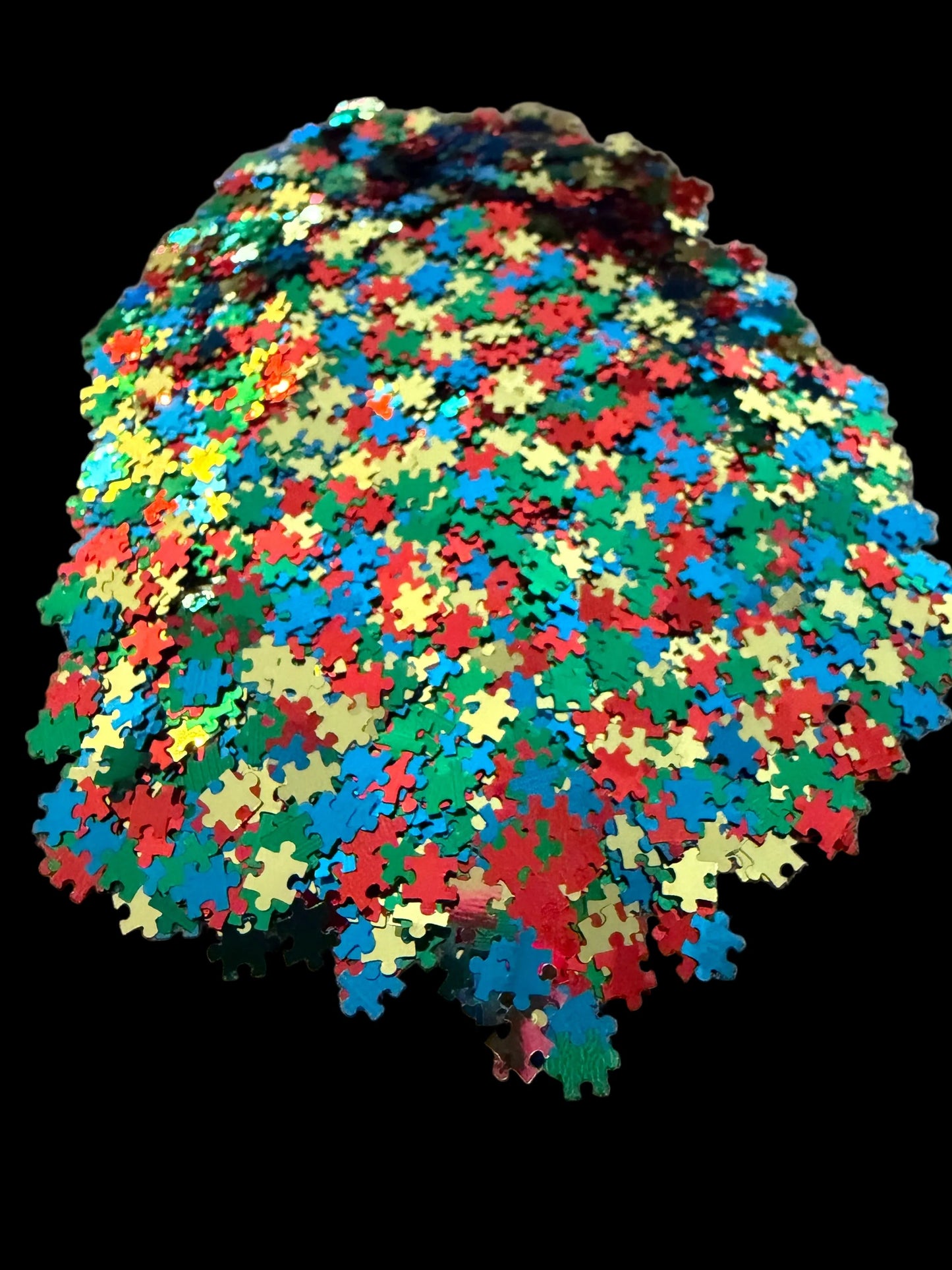 Puzzle pieces shaped glitter